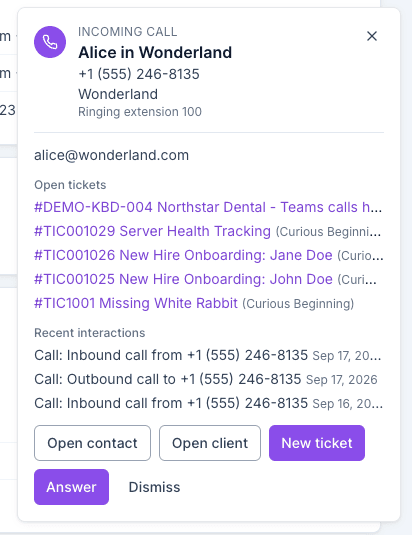 Incoming call card showing the caller name, number, client, and ringing extension, with open tickets, recent interactions, and Open contact, Open client, New ticket, Answer, and Dismiss actions